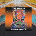 Rising Angels CD set against a colourful mural