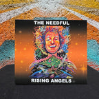 Rising Angels CD set against a colourful mural