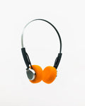 Orange retro headphones with black wires on a white background